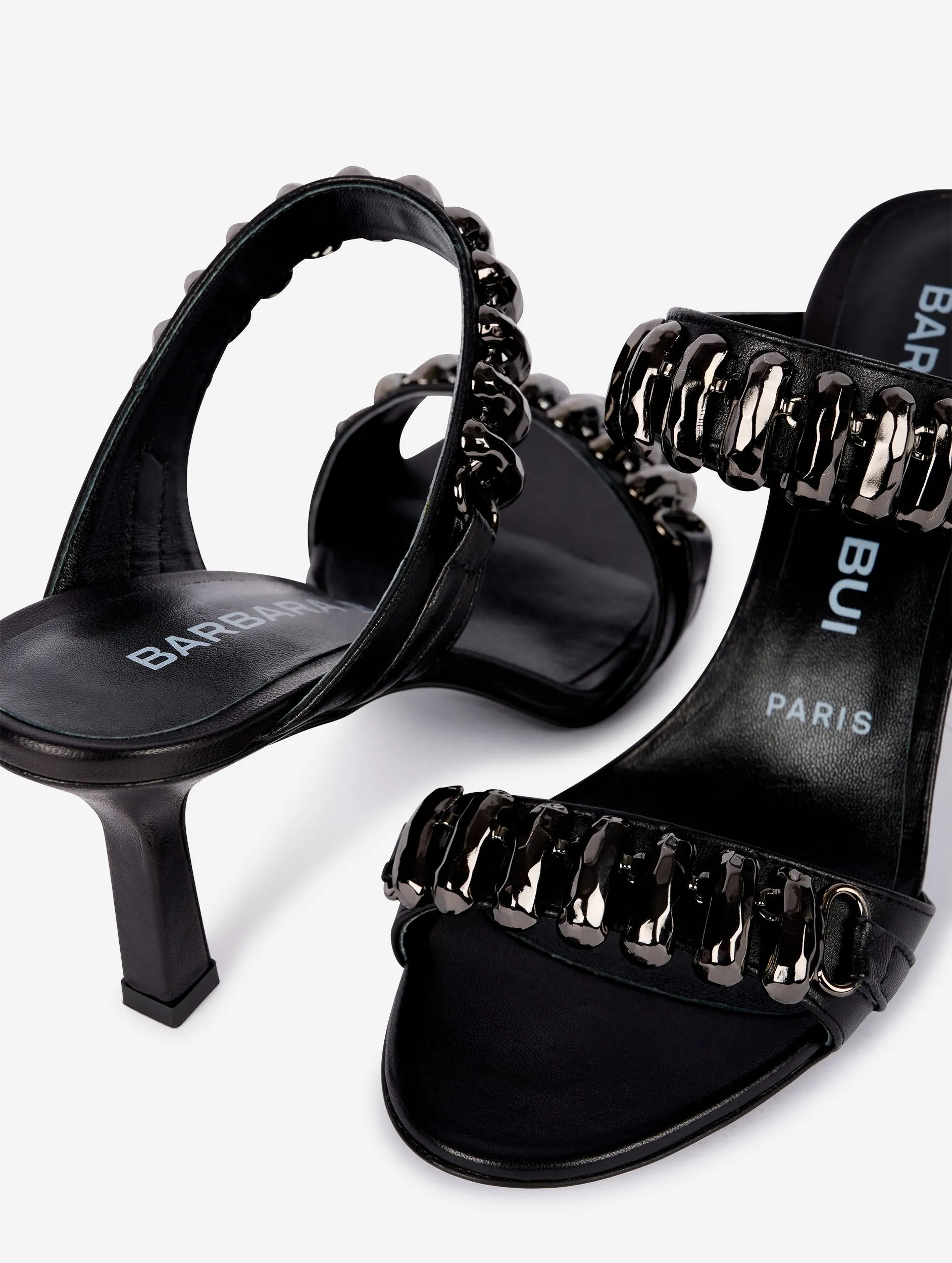 mules en cuir noir